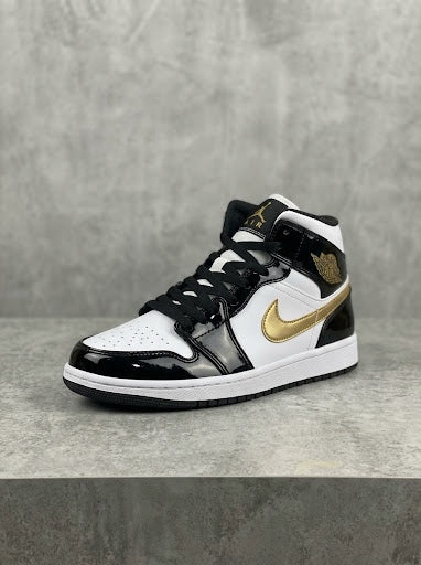 Air Jordan 1 Mid Blanco Negro con Dorados