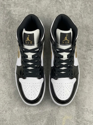 Air Jordan 1 Mid Blanco Negro con Dorados