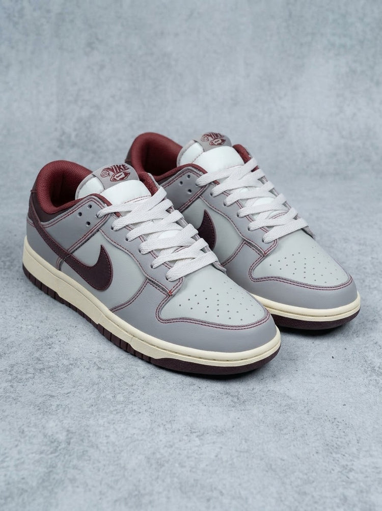 Nike Dunk Low Retro SE Gris y Vinotinto