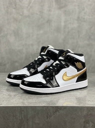 Air Jordan 1 Mid Blanco Negro con Dorados